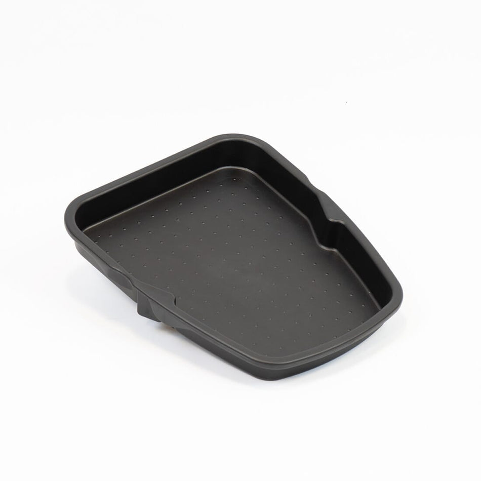 Angled view of NRS Freestyle Rollator Tray rollator with seat, padded backrest, storage bag and four wheels on a plain background.