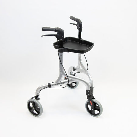 Close-up of the brake mechanism on NRS Freestyle Rollator Tray rollator's wheel with spring and cable detail.