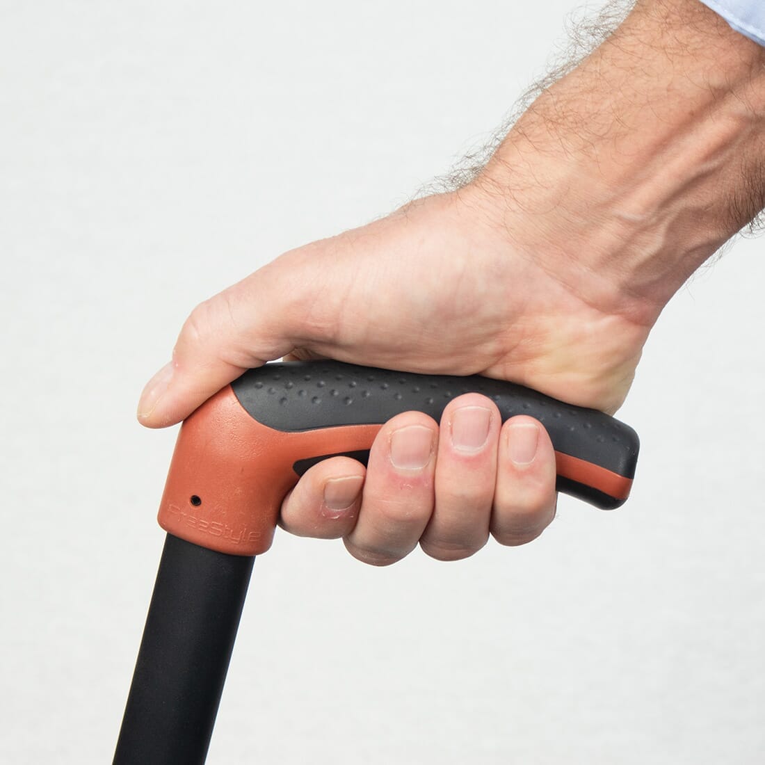 Close-up of the handle on NRS Freestyle Walking Stick walking stick, highlighting the ergonomic grip.