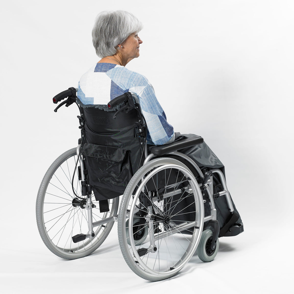 Lifestyle image of NRS Freestyle Wheelchair Cosy being used in a real-life setting.