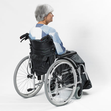 Lifestyle image of NRS Freestyle Wheelchair Cosy being used in a real-life setting.