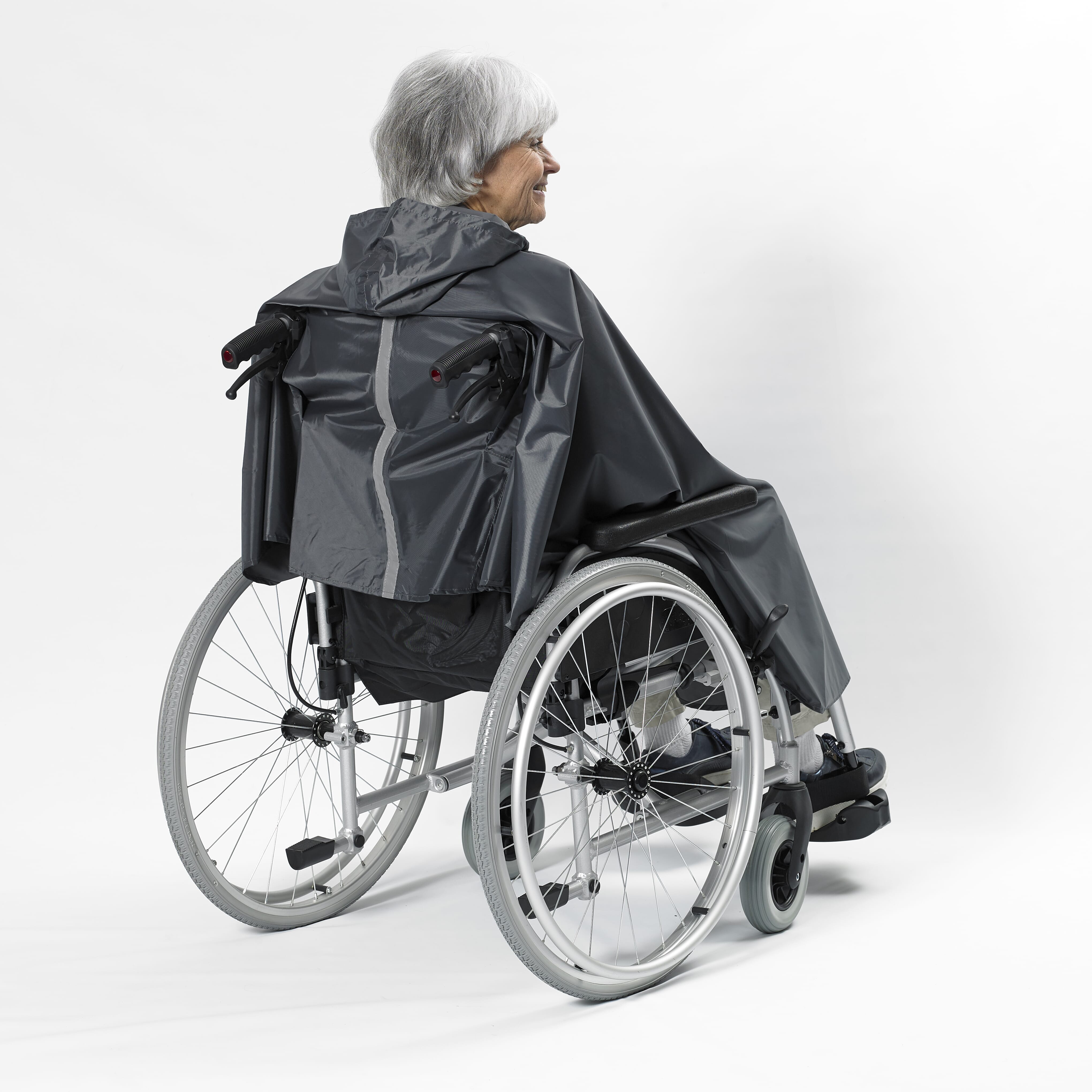 Lifestyle image of NRS Freestyle Wheelchair Poncho being used in a real-life setting.