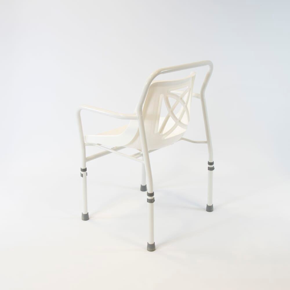 Close-up of a leg on NRS Height Adjustable Economy Shower Chair, highlighting the height adjustment mechanism and non-slip rubber ferrule.