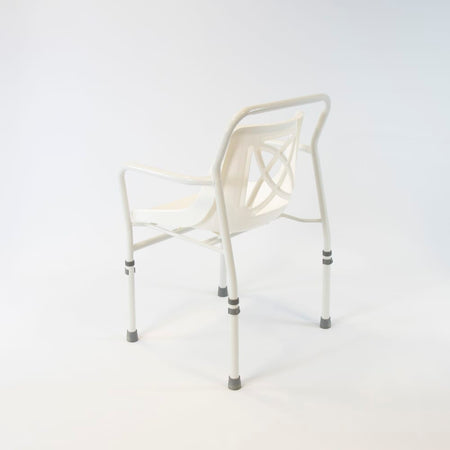 Close-up of a leg on NRS Height Adjustable Economy Shower Chair, highlighting the height adjustment mechanism and non-slip rubber ferrule.