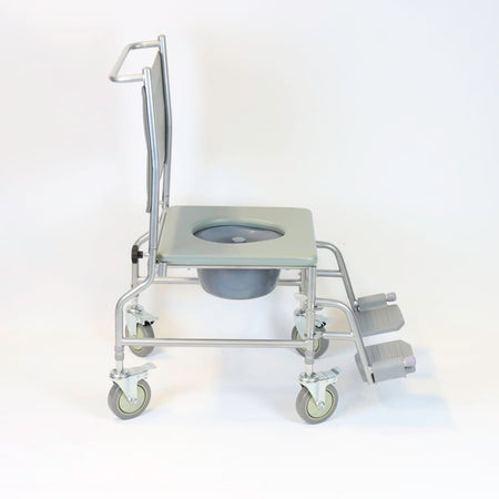 NRS Height Adjustable Wheeled Commode in use in a home setting, with lid open to illustrate accessibility and convenience.