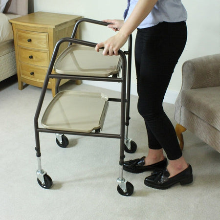 Lifestyle image of NRS Home Helper Wheeled Trolley being used in a real-life setting.
