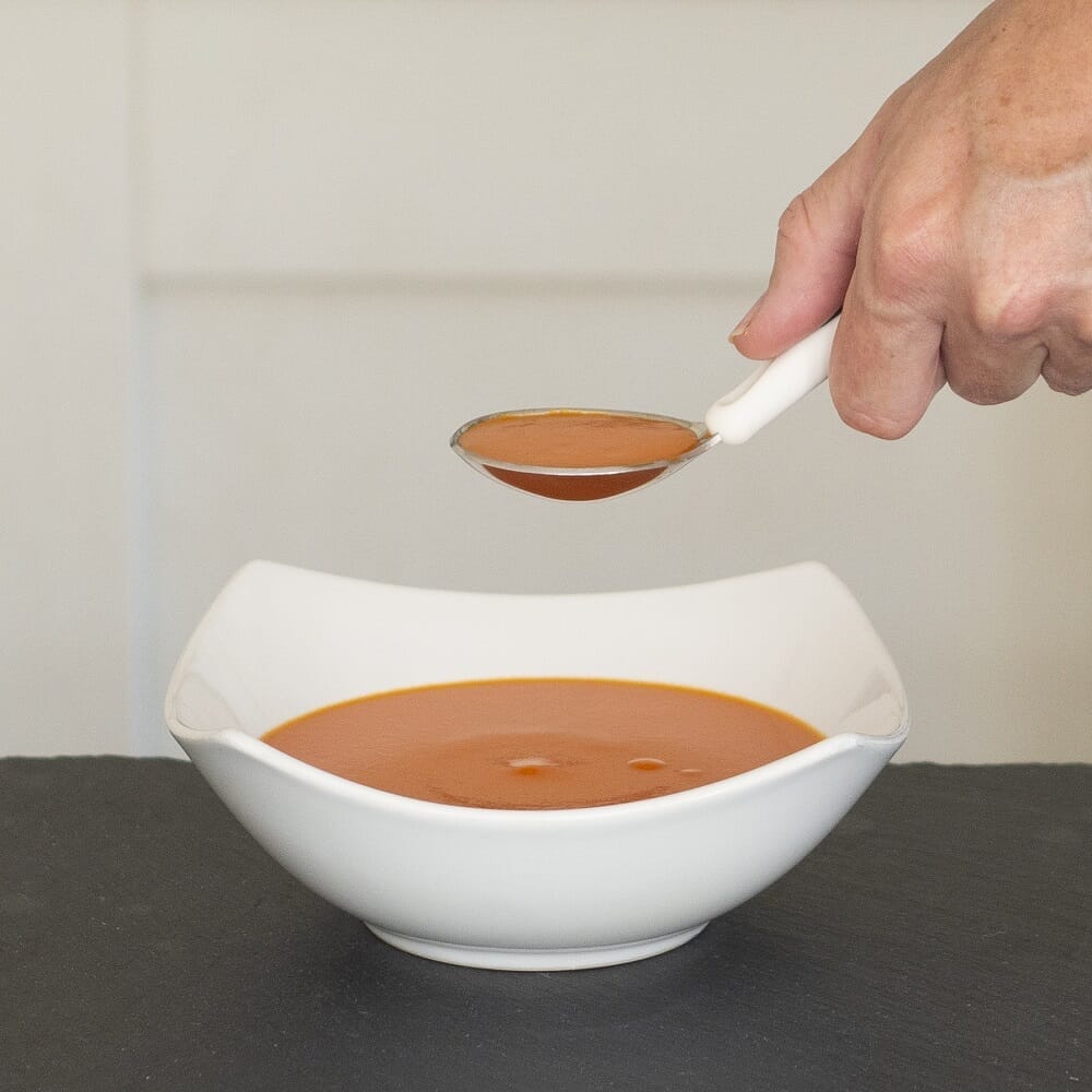 Close-up of a feature of NRS Kura Care Adult Soup Spoon.