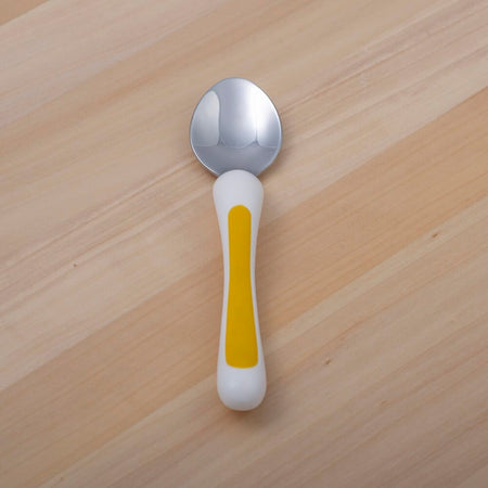 Lifestyle image of NRS Kura Care Junior Spoon being used in a real-life setting.