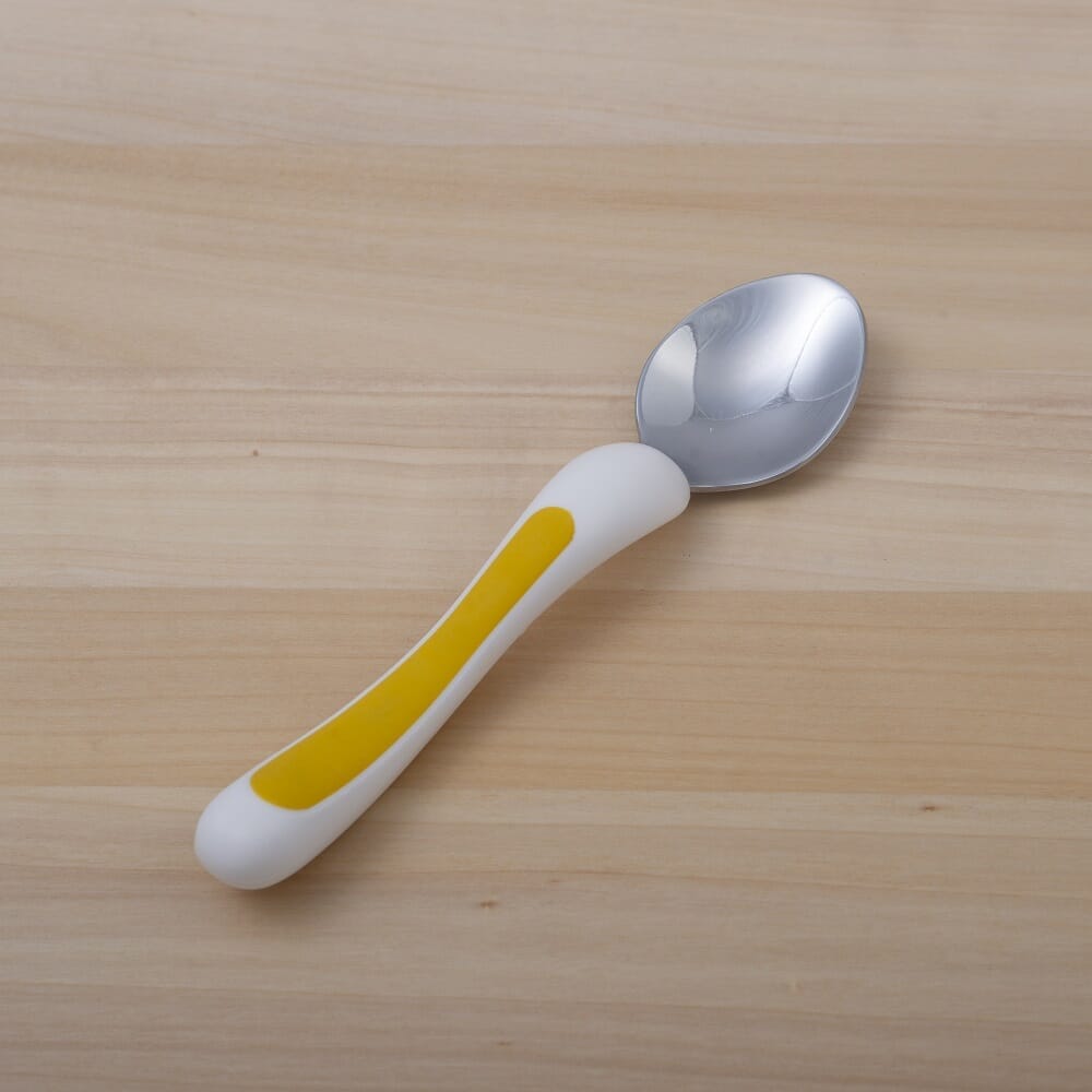 Diagram or packaging of NRS Kura Care Junior Spoon highlighting dimensions or features.