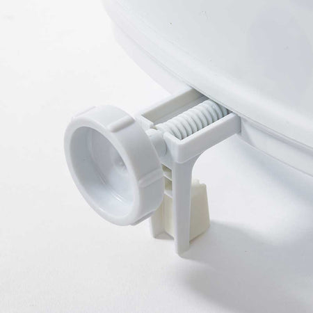 Lifestyle image of NRS Linton Plus Raised Toilet Seat being used in a real-life setting.