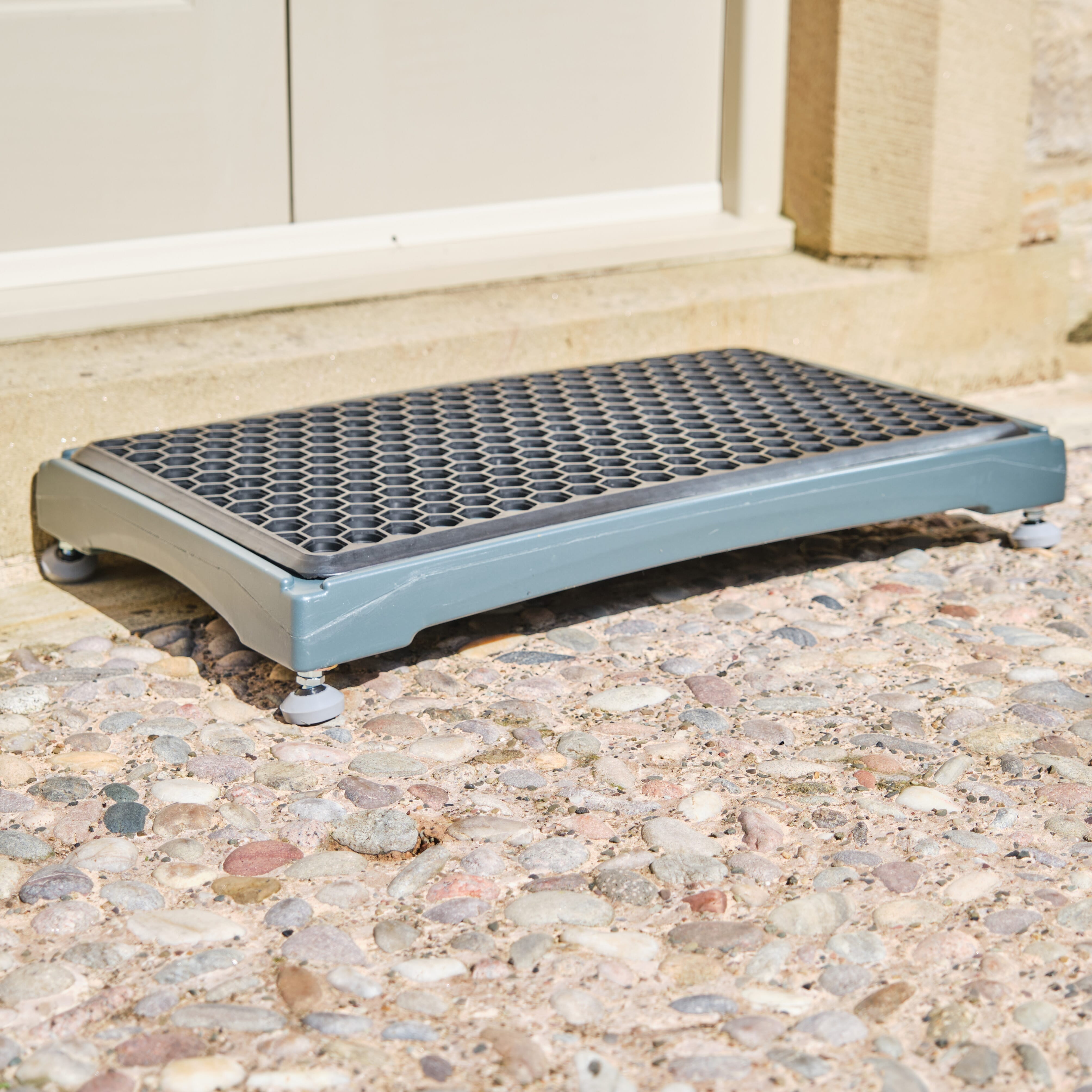 Alternative view of NRS Mobility Care Outdoor Plastic Half Step, showing different angle or usage.