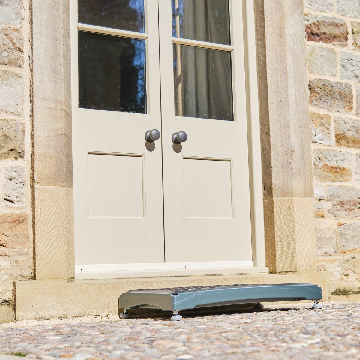 Close-up of a feature of NRS Mobility Care Outdoor Plastic Half Step.