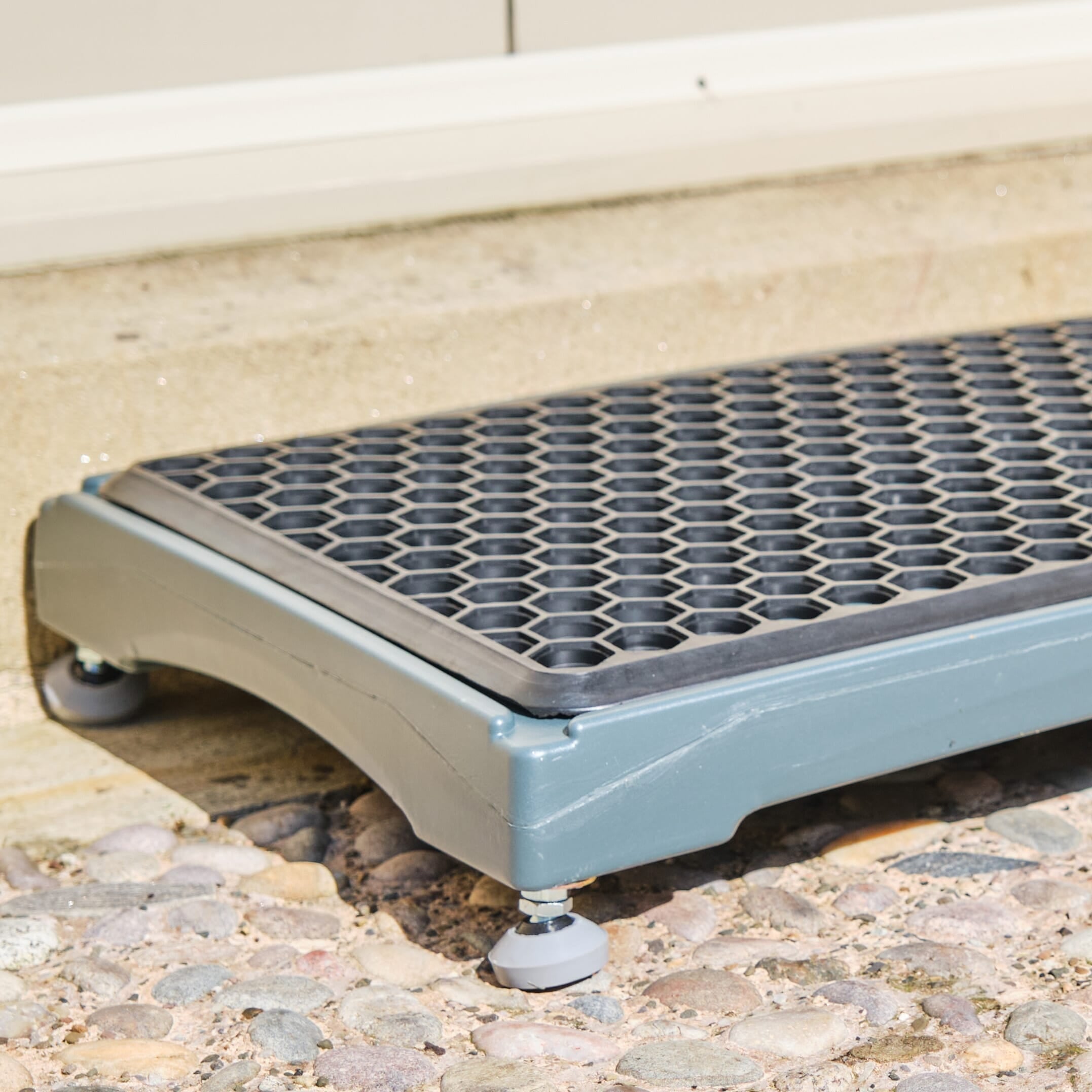 Lifestyle image of NRS Mobility Care Outdoor Plastic Half Step being used in a real-life setting.