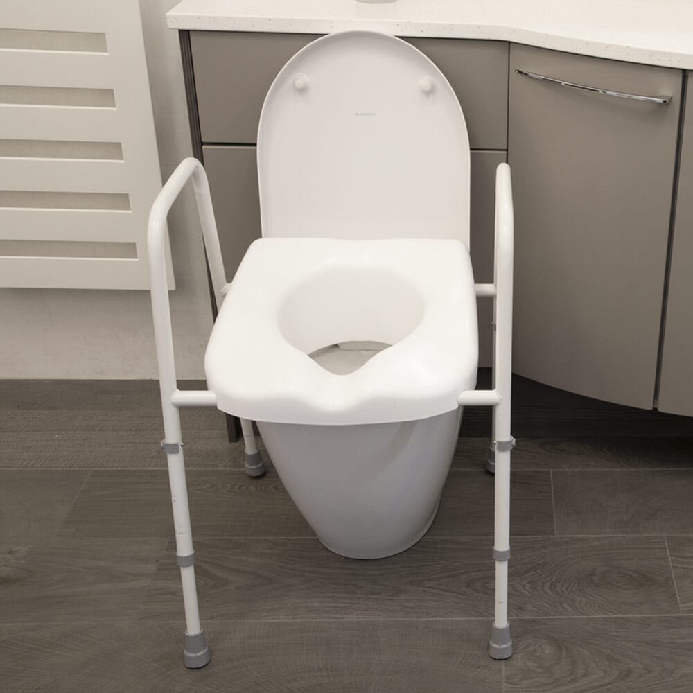 Diagram or packaging of NRS Mowbray Lite Adjustable Toilet Frame with Seat highlighting dimensions or features.