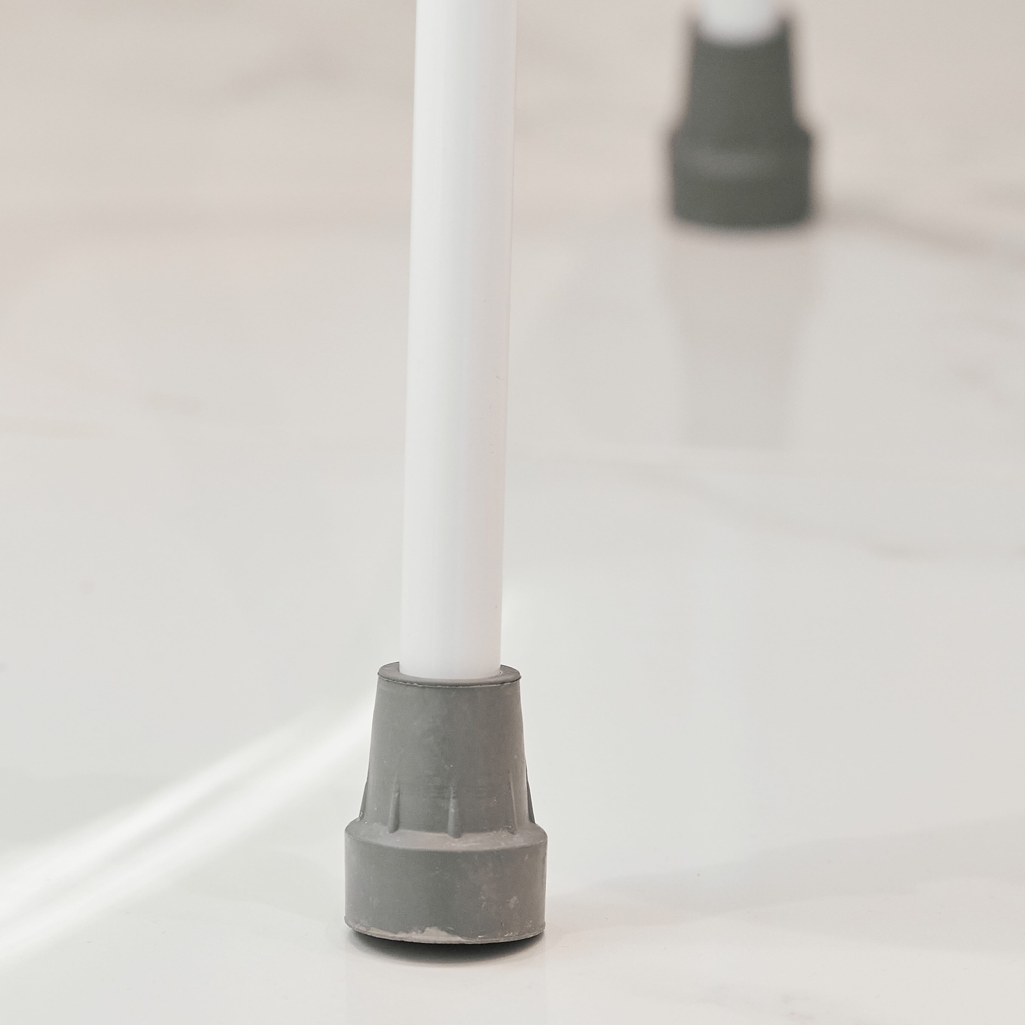 Alternative view of NRS Mowbray Lite Toilet Frame Seat-Width Adjustable, showing different angle or usage.