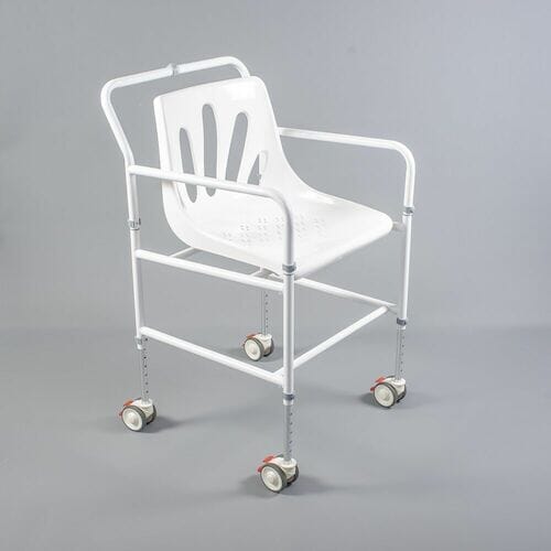 Angled view of NRS NUVO Shower Chair with moulded seat, supportive backrest and height-adjustable legs on a plain background.