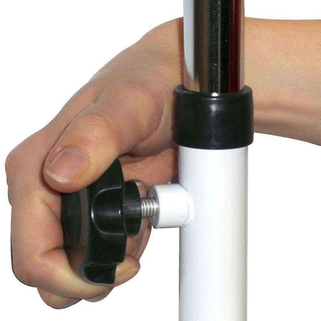 Close-up of the castor wheels on NRS Overbed Table, showing the smooth-rolling casters and brake mechanism.