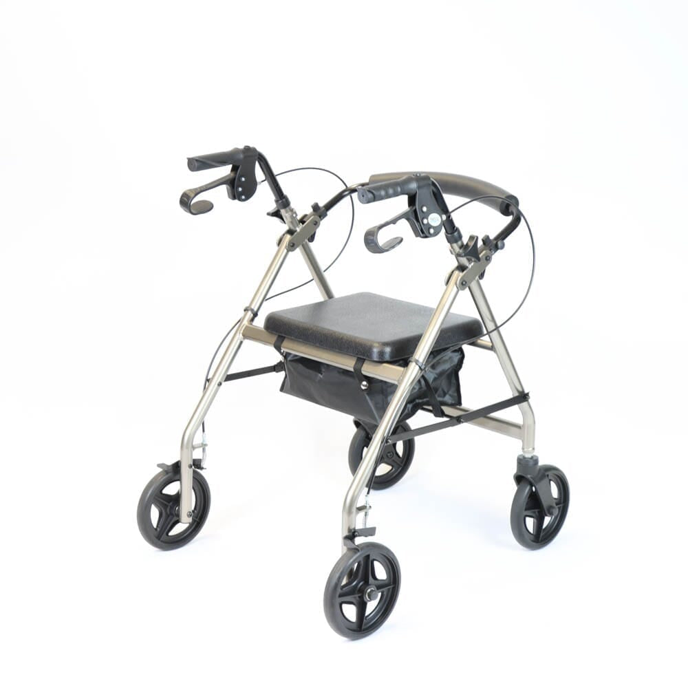 Fully folded NRS Petite A-Series Lightweight 4 Wheel Rollator rollator lying flat, showing the triple-fold mechanism and compact size.