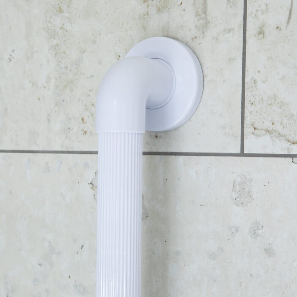 Close-up of a wall mounting plate on NRS Plastic Fluted Grab Rail grab rail showing screw holes for secure installation.