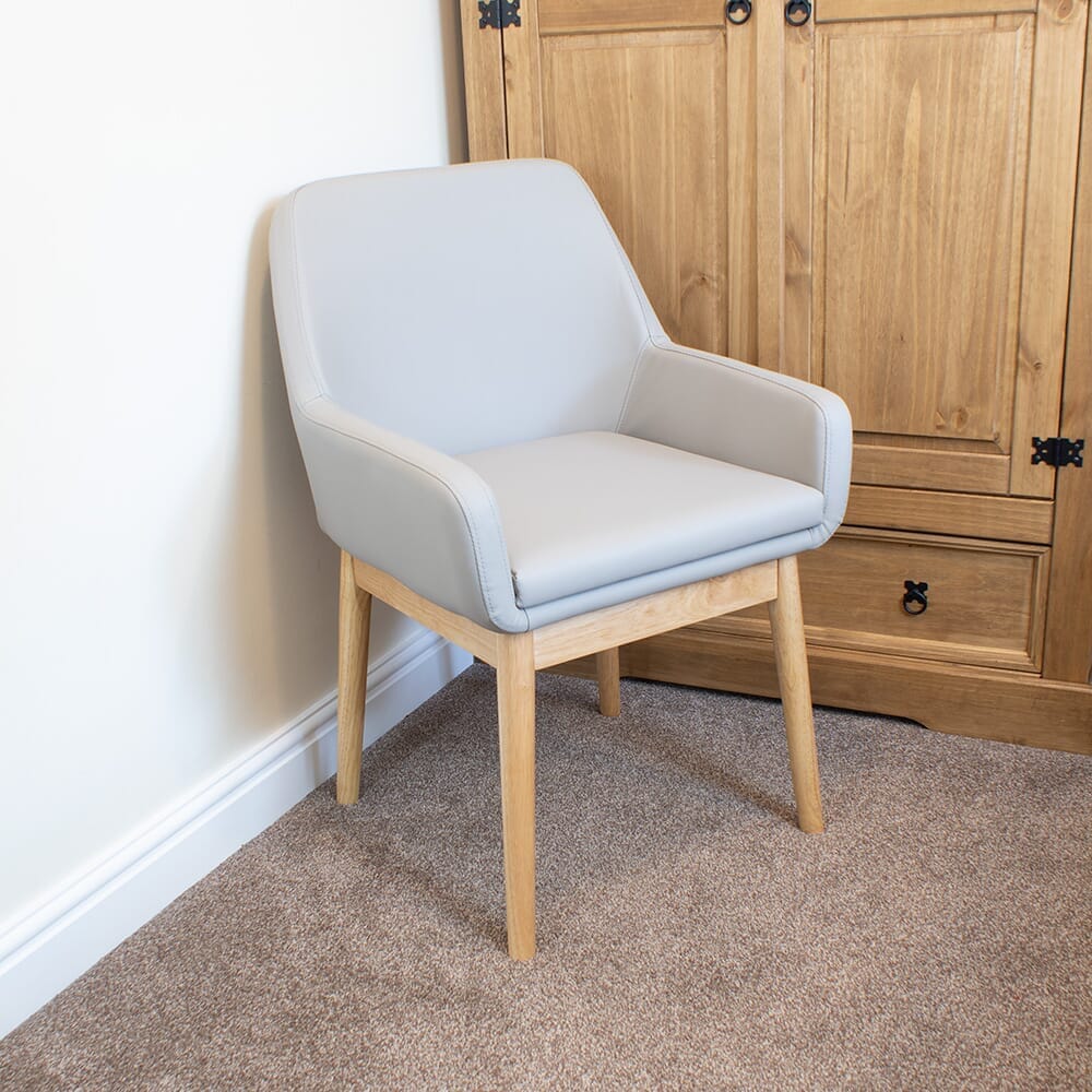 NRS Sanctuary Commode positioned in a home environment such as a bedroom or bathroom, demonstrating its discreet appearance.