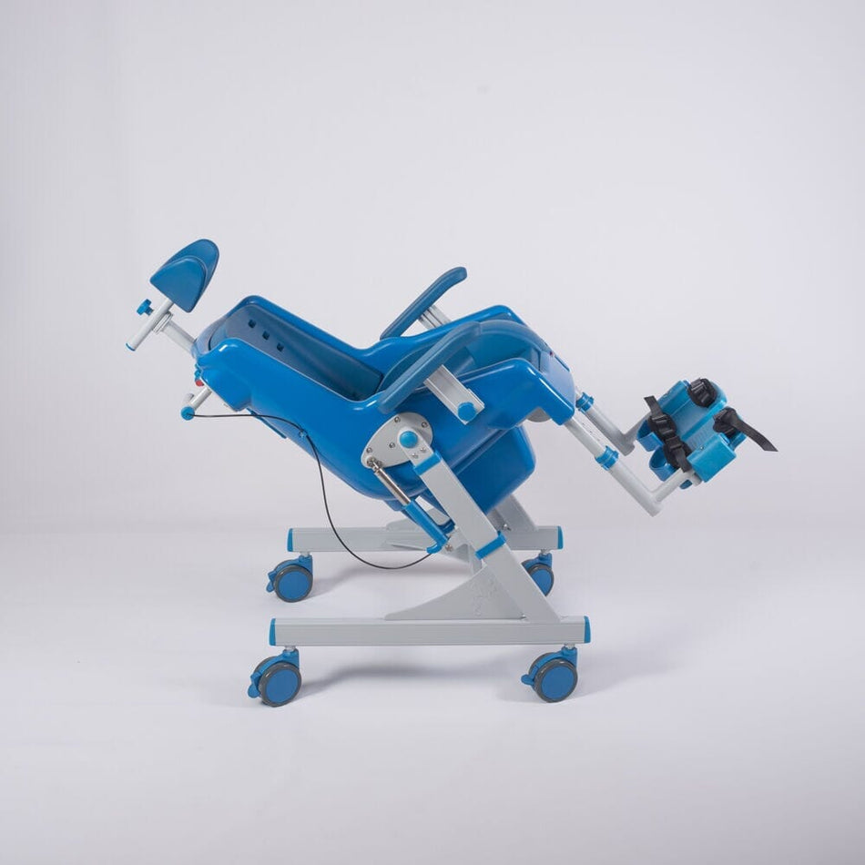 Front view of NRS Seahorse Plus Toileting Shower Chair showing drainage holes in the seat and the supportive backrest design.