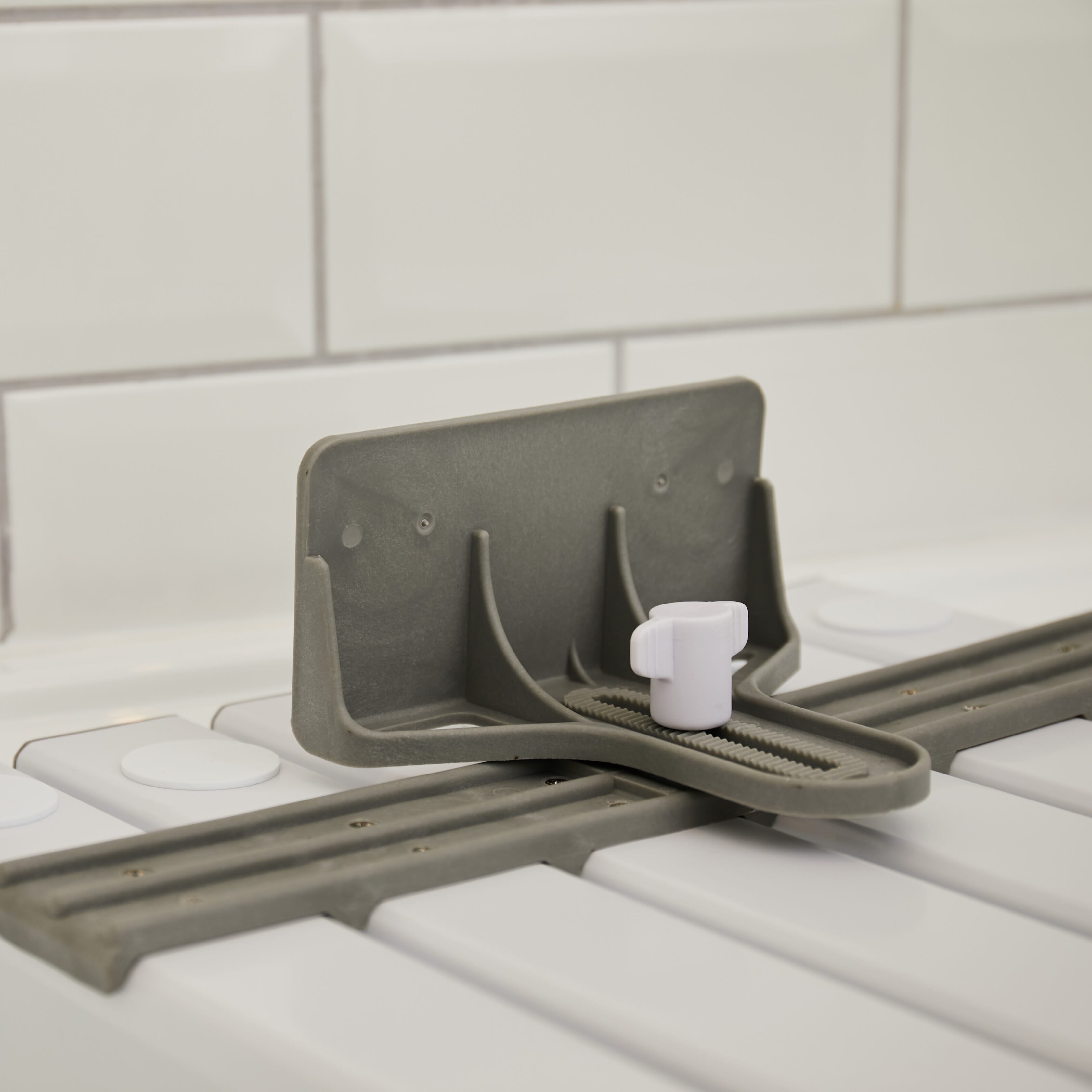 Close-up of the handle on NRS Slatted Shower Board, highlighting its secure grip for safe transfers.