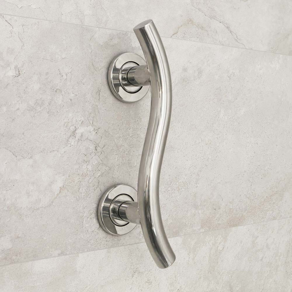 Full view of NRS Spa Stainless Steel Curved Grab Rail-350mm grab rail with circular wall plates and a textured grip, designed to provide support in bathrooms and other areas.