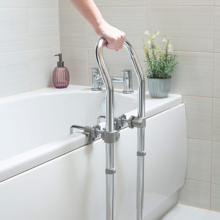 Full view of NRS Swedish Bath Grab Rail grab rail with circular wall plates and a textured grip, designed to provide support in bathrooms and other areas.