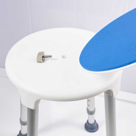 NRS Swivel Shower Stool placed in a shower to demonstrate safe, space-saving seating.