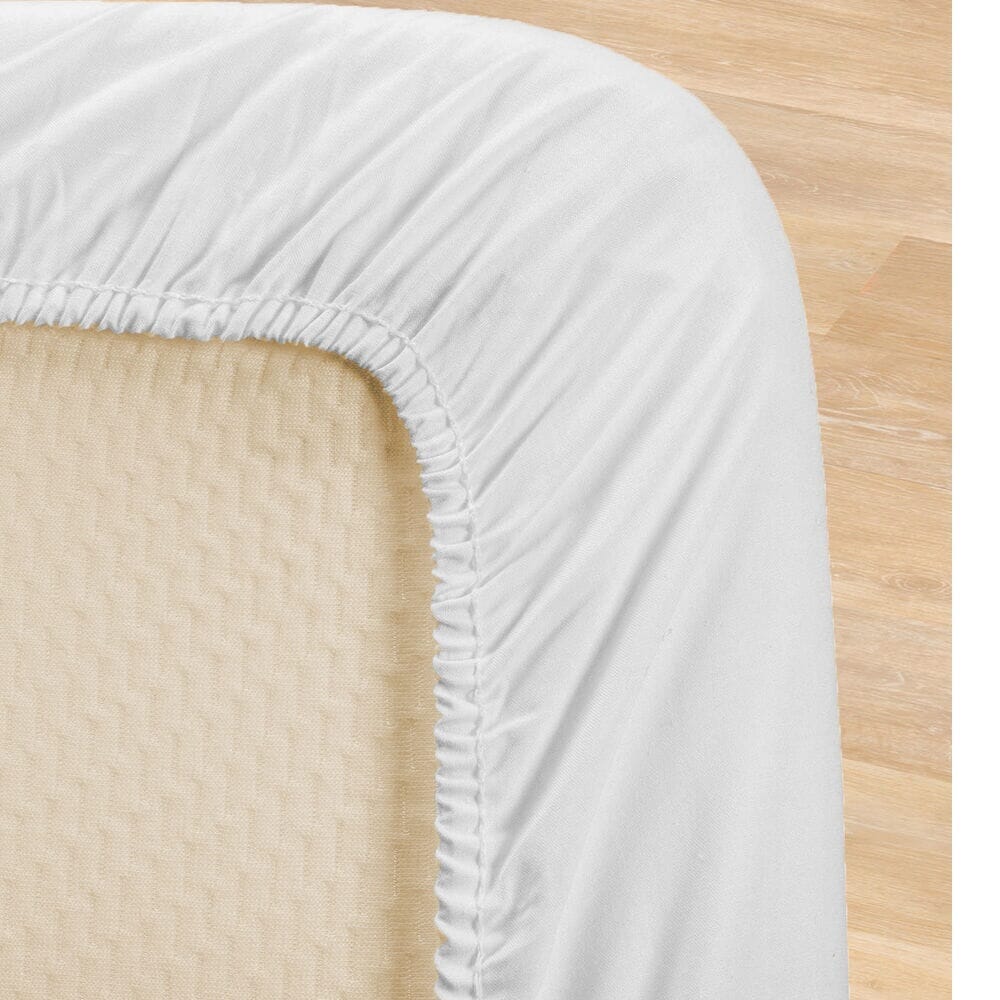 Close-up of the waterproof backing and stitching on NRS Terry Towelling Waterproof Mattress Protector mattress protector.