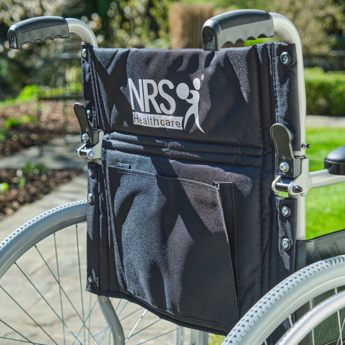 Lifestyle image of NRS Transit-Lite Self-Propelled Wheelchair being used in a real-life setting.