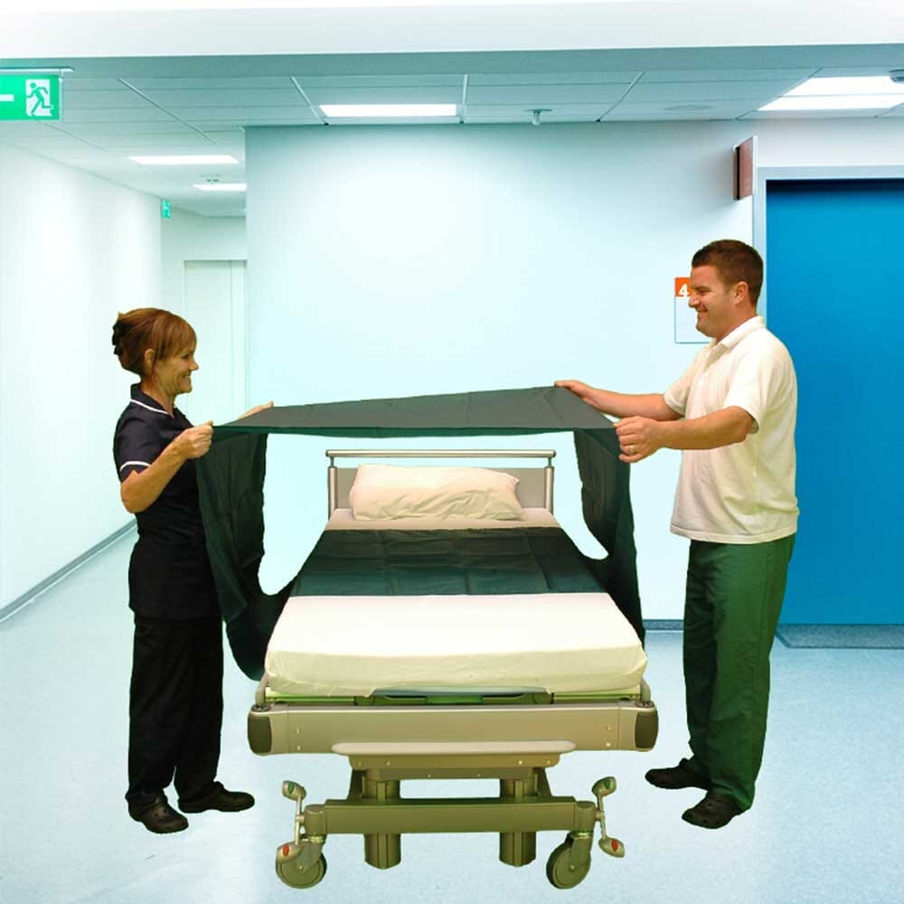 Lifestyle image of NRS Tubular Multi-Mover Slide Sheet being used in a real-life setting.