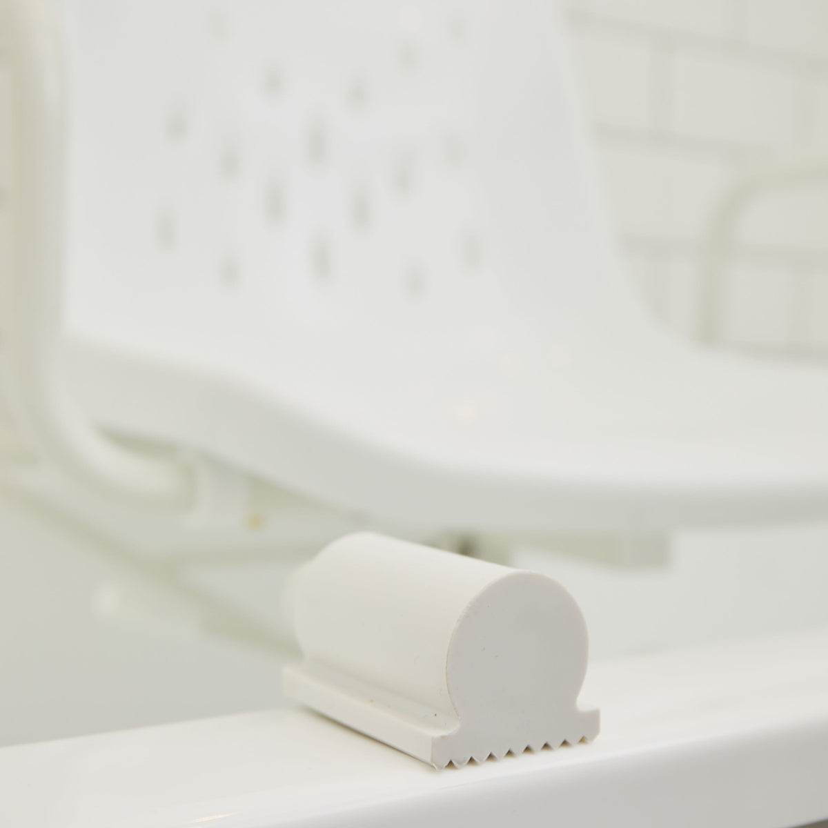 Lifestyle image of NRS Width Adjustable Swivel Bath Seat being used in a real-life setting.