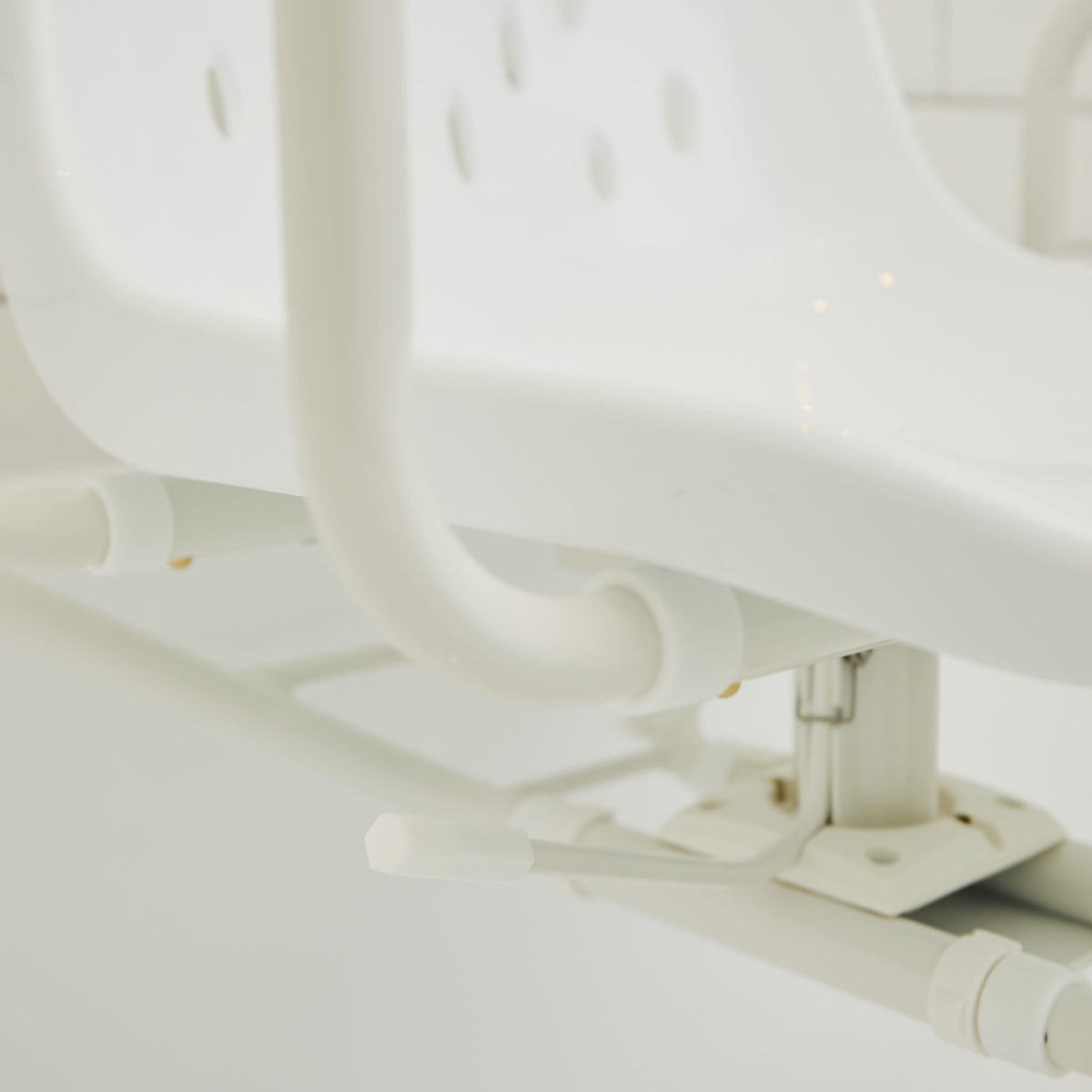 Diagram or packaging of NRS Width Adjustable Swivel Bath Seat highlighting dimensions or features.