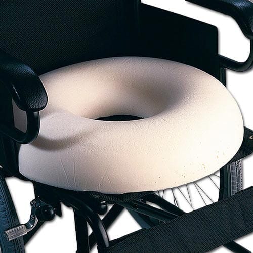 Original Ring Cushion cushion on a seat or chair, demonstrating added comfort and pressure relief.