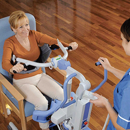 Close-up of the sling attachment points or spreader bar on Oxford Journey Stand Aid hoist.