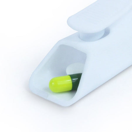 Lifestyle image of Pill Dispenser Remover being used in a real-life setting.