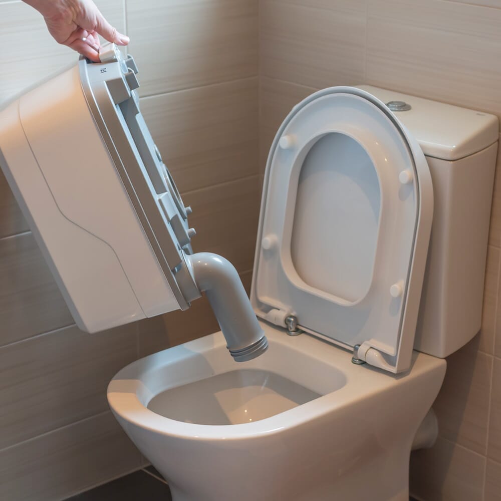 Diagram or packaging of Porta Potti 165 Portable Flushing Toilet highlighting dimensions or features.