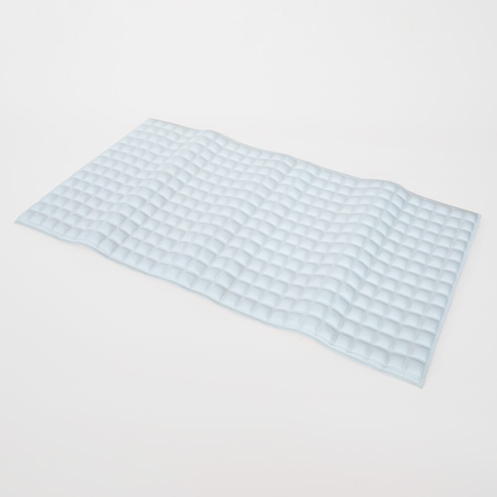 Diagram or packaging of Pressure Relieving Bath Mat highlighting dimensions or features.