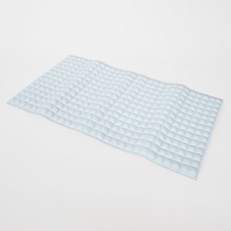 Diagram or packaging of Pressure Relieving Bath Mat highlighting dimensions or features.