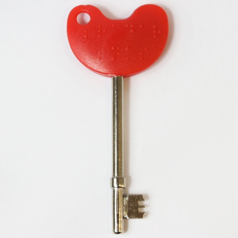 Lifestyle image of RADAR National Key Scheme Key With Easy Turn Red Handle being used in a real-life setting.