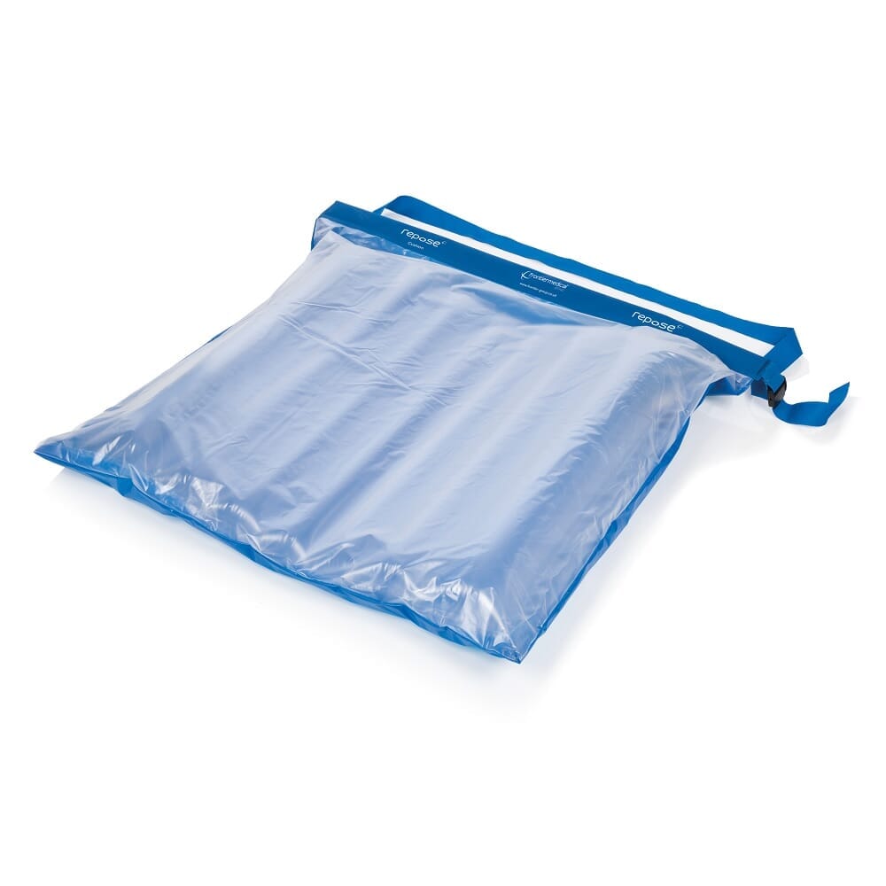 Repose Cushion cushion on a seat or chair, demonstrating added comfort and pressure relief.