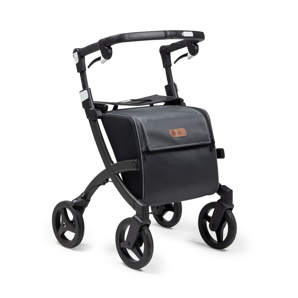 Angled view of Rollz Flex 2 0 Rollator rollator with seat, padded backrest, storage bag and four wheels on a plain background.