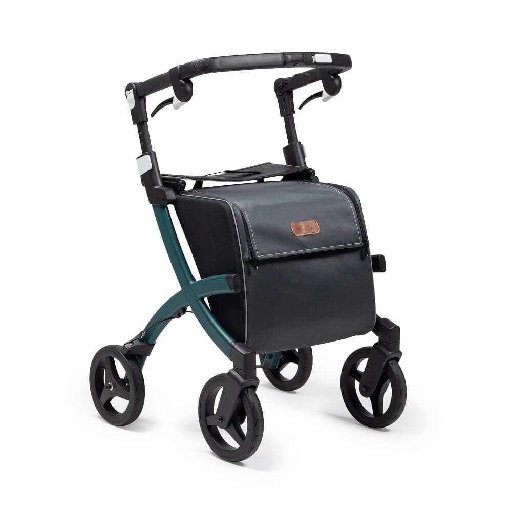 Angled view of Rollz Flex 2 0 Rollator rollator with seat, padded backrest, storage bag and four wheels on a plain background.