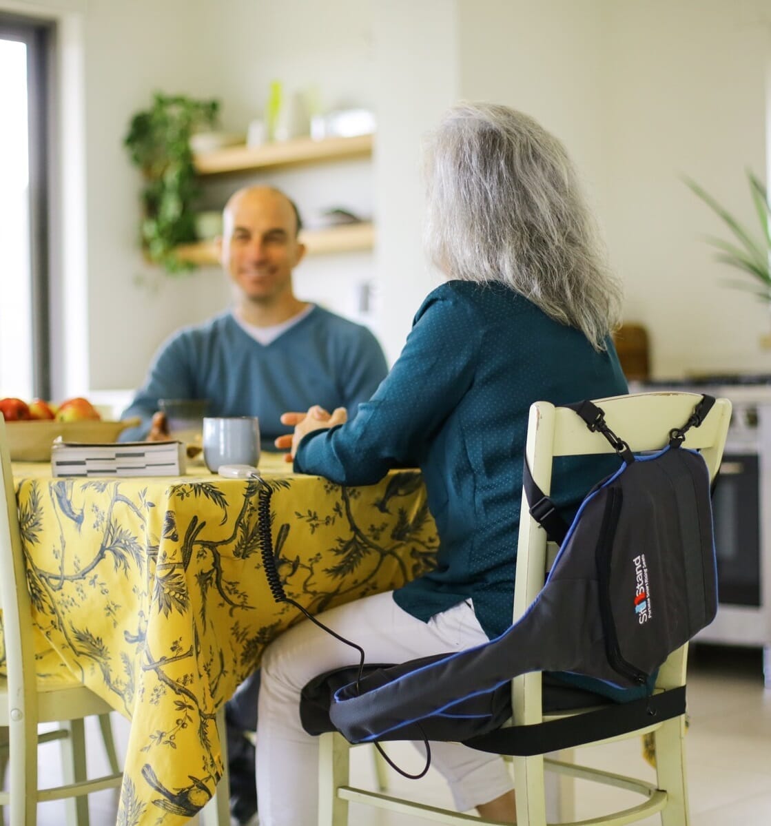 Alternative view of SitnStand Compact Portable Rising Seat, showing different angle or usage.