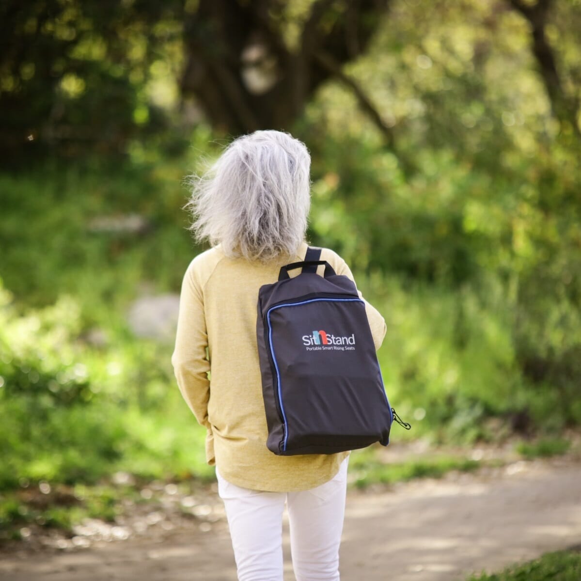 Diagram or packaging of SitnStand Compact Portable Rising Seat highlighting dimensions or features.