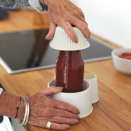 Alternative view of Spillnot Jar Bottle Opener, showing different angle or usage.