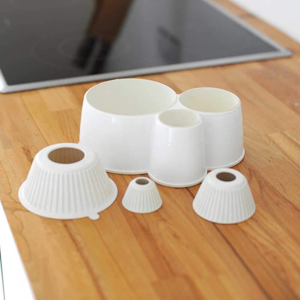 Lifestyle image of Spillnot Jar Bottle Opener being used in a real-life setting.