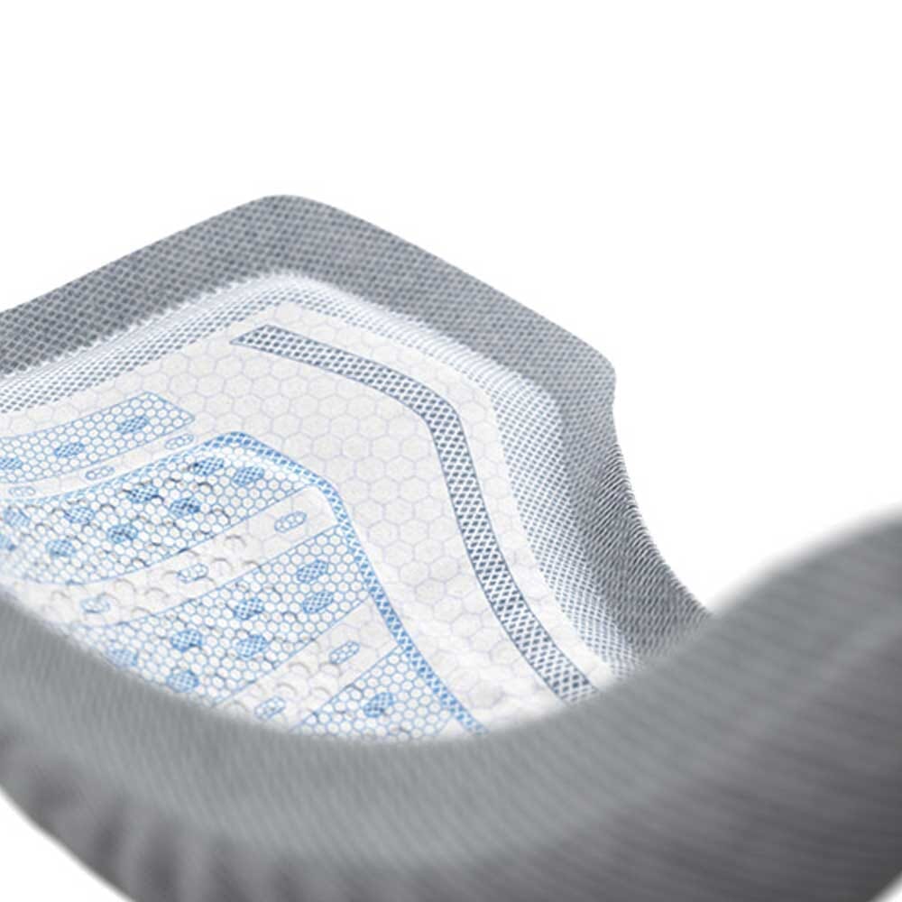 Close-up of a feature of TENA Men Discreet Incontinence Pads.