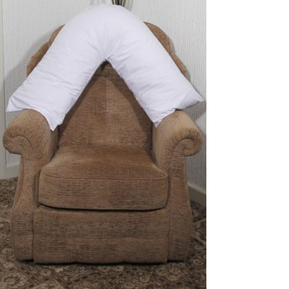 Full view of V-Shaped Polycotton Pillow cushion on a plain background, showing its shape and supportive material.
